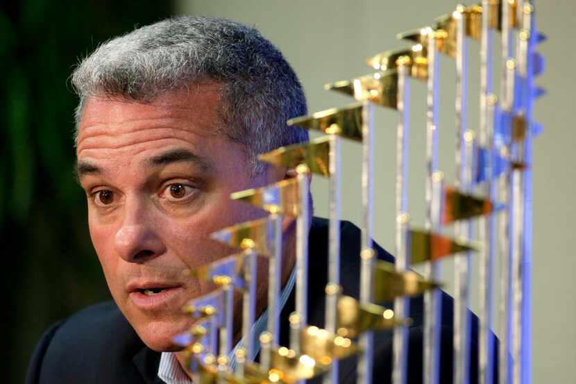 FILE - Kansas City Royals General Manager Dayton Moore speaks to members of the media...
