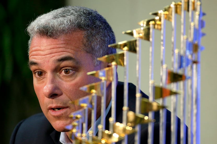 FILE - Kansas City Royals General Manager Dayton Moore speaks to members of the media...
