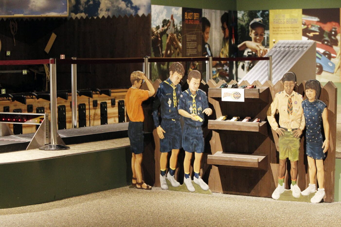 Visitors can race pinewood derby cars on a   six-lane track at the Boys Scouts of America...