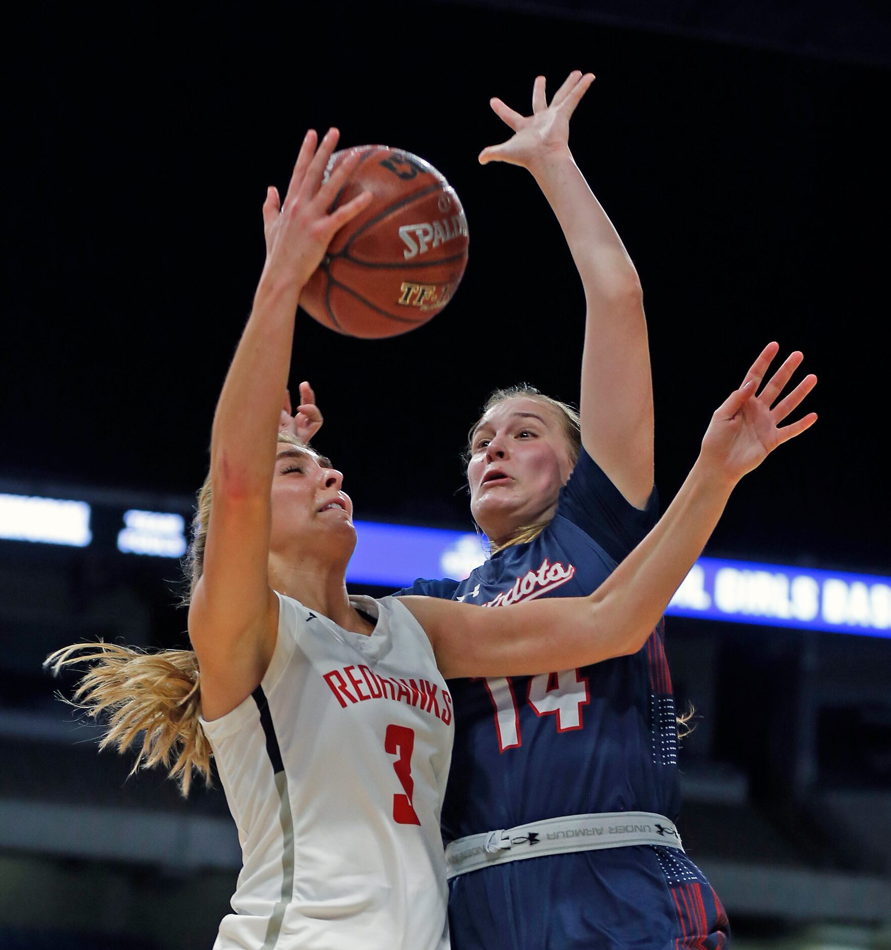 Frisco Liberty guard Lily Ziemkiewicz #3 drives on Veterans Memorial guard Breanna Perez #14...