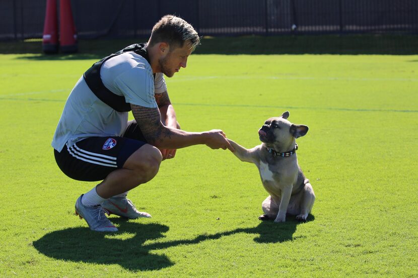 Reto Ziegler and his dog.