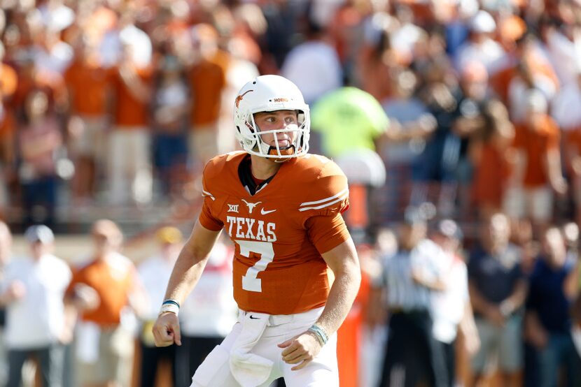 Texas Longhorns quarterback Shane Buechele (7) looks to the sidelines against West Virginia...