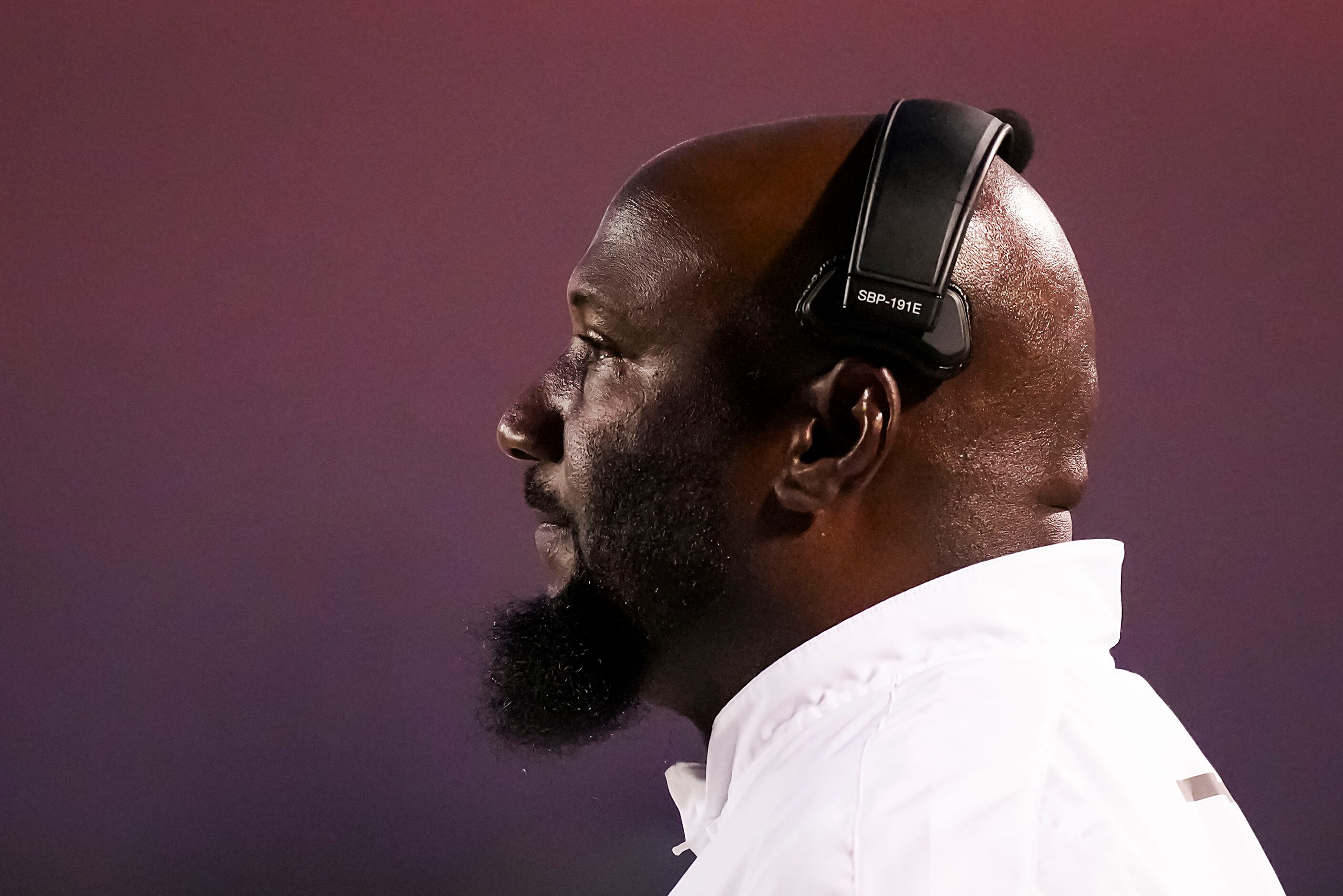 Wilmer-Hutchins head coach Elzie Barnett looks on from the sidelines during the first half...