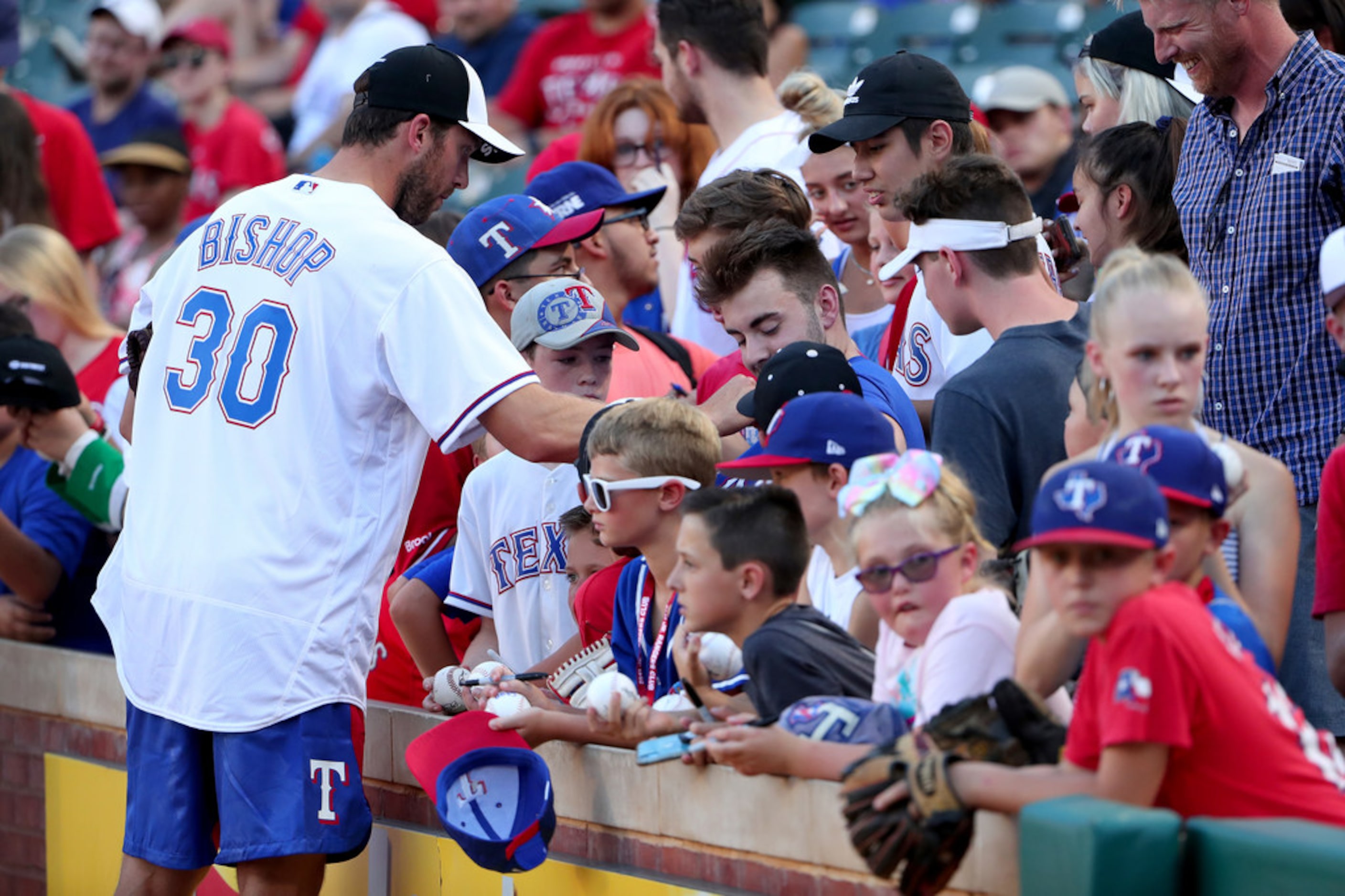 ARLINGTON, TEXAS - JULY 17: Ben Bishop of the Dallas Stars sign autographs for fans before...