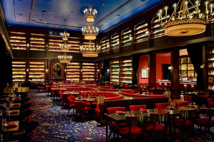 The dining room at the NoMad Las Vegas has a storybook feel — and more than 20,000 old books...
