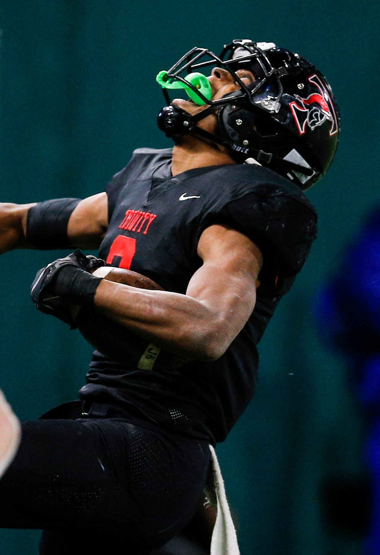 Euless Trinity junior running back Ollie Gordon (2) celebrates scoring a touchdown during...