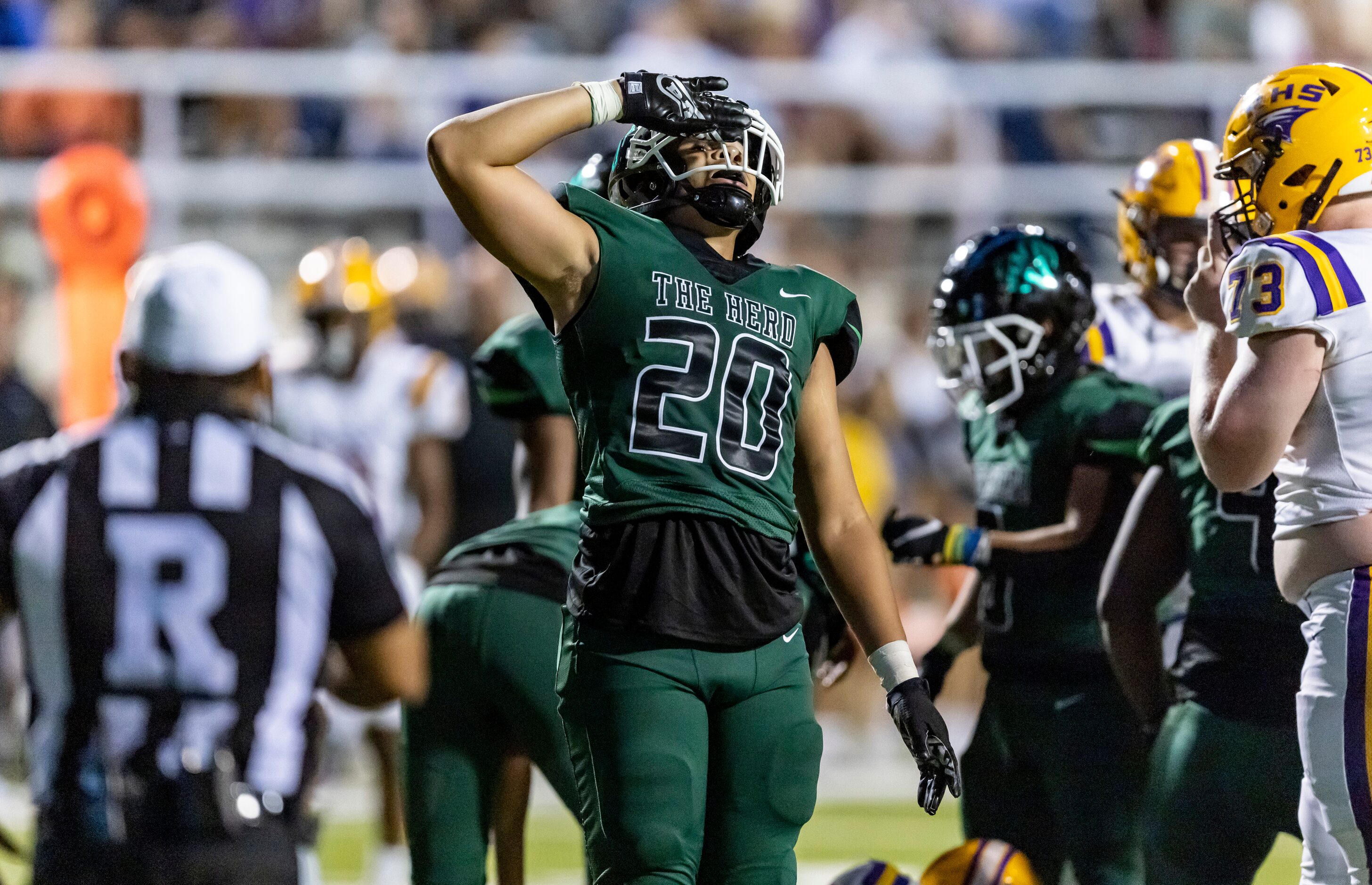 Berkner junior defensive end Yamil Talib (20) celebrates tackling Richardson senior...