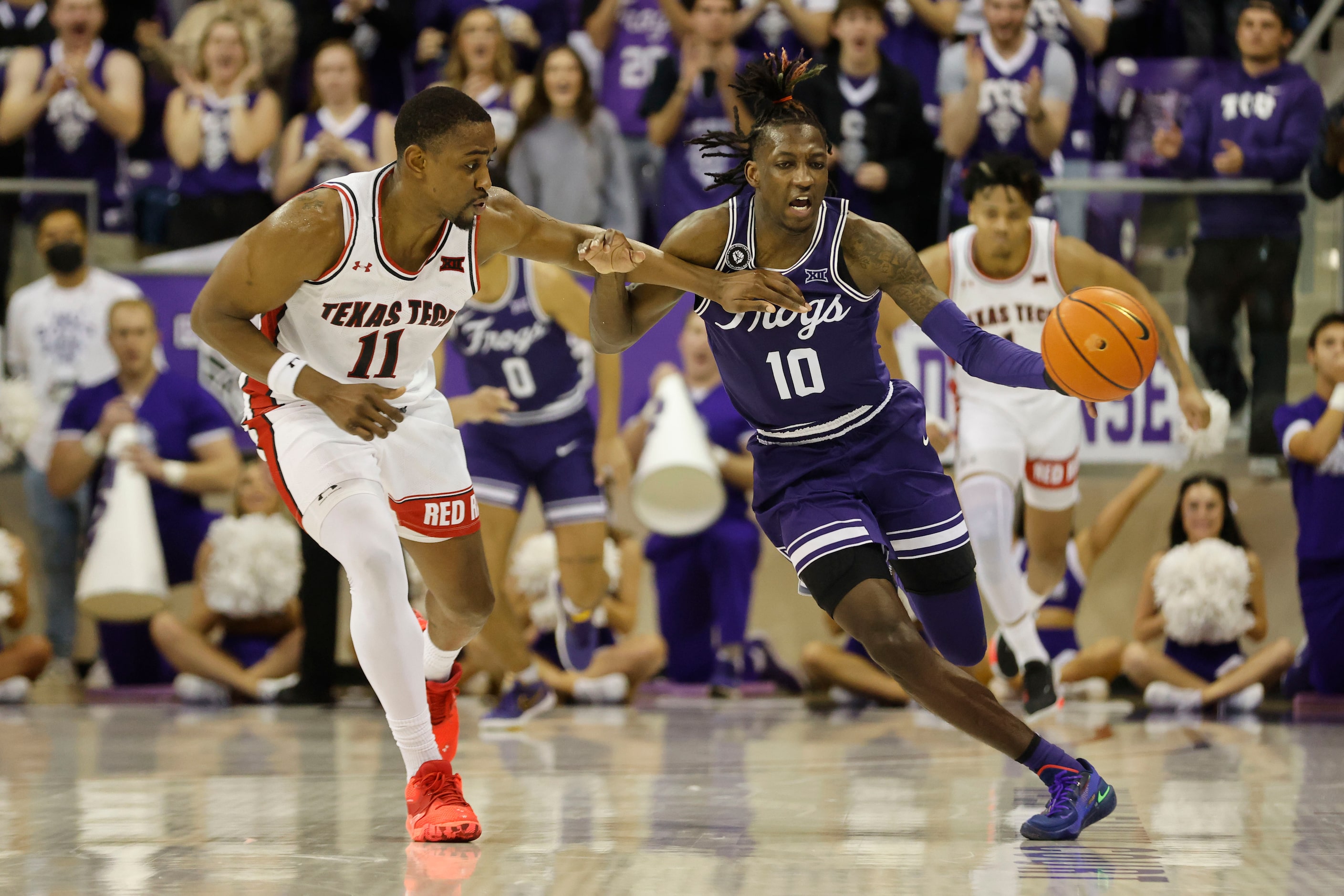 TCU guard Damion Baugh (10) steals the ball on a pass intended for Texas Tech forward Bryson...