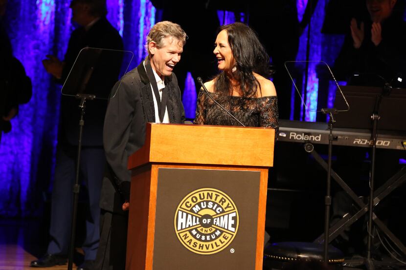 From left, artist Randy Travis and wife Mary Travis as the Country Music Hall of Fame...