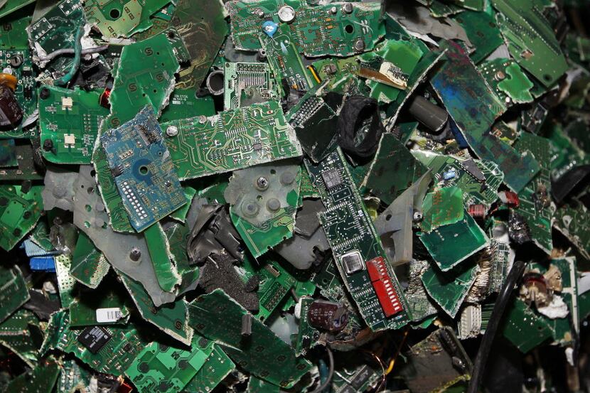 High-grade circuit boards are collected during the recycling process. (David Woo/The Dallas...