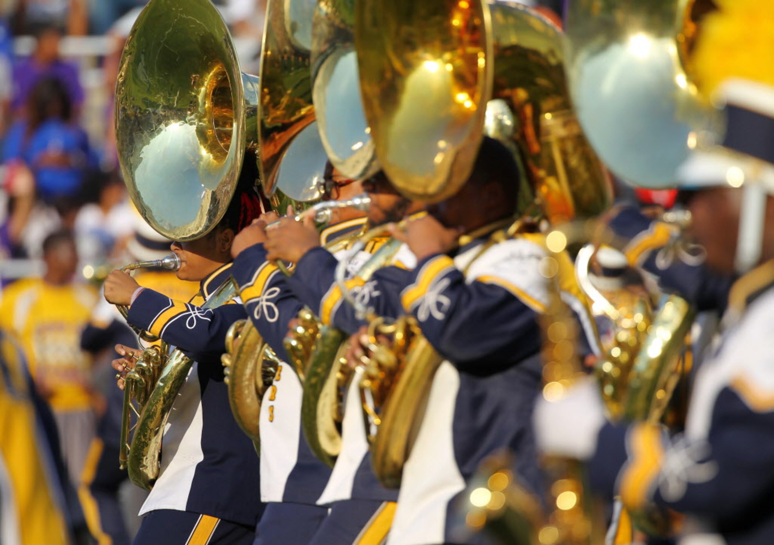 Prairie View A&M marching band performs during halftime during a college football game...