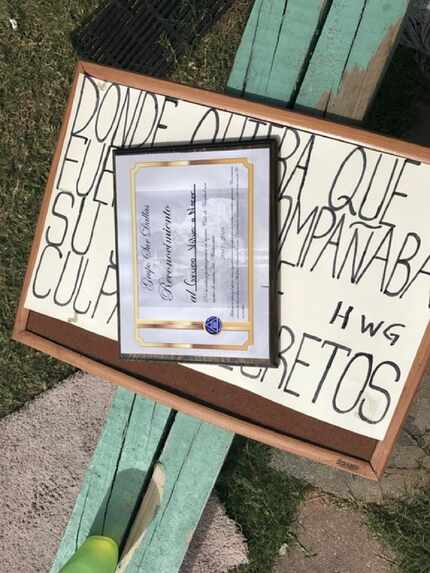 Signs removed from 2401 Penn St. include a certificate with the name of the 24-hour sober...
