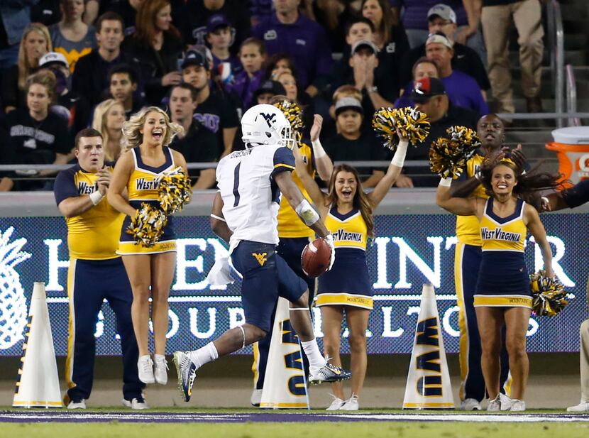 West Virginia Mountaineers wide receiver Shelton Gibson (1) celebrates a touchdown in a game...