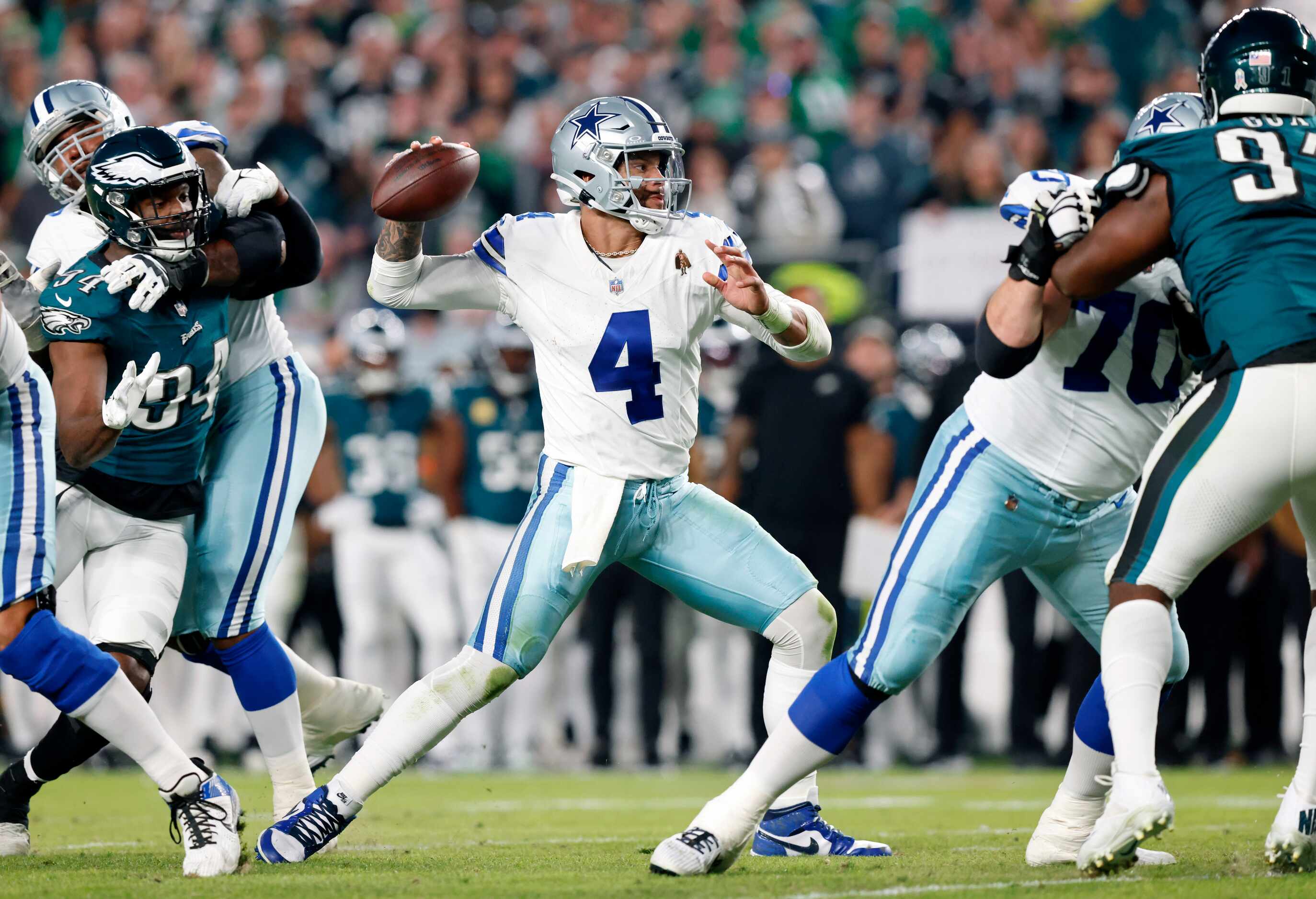Dallas Cowboys quarterback Dak Prescott (4) throws a first half pass against the...