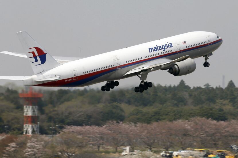 A Malaysia Airlines Boeing 777-200ER similar to the one that lost contact on a flight from...