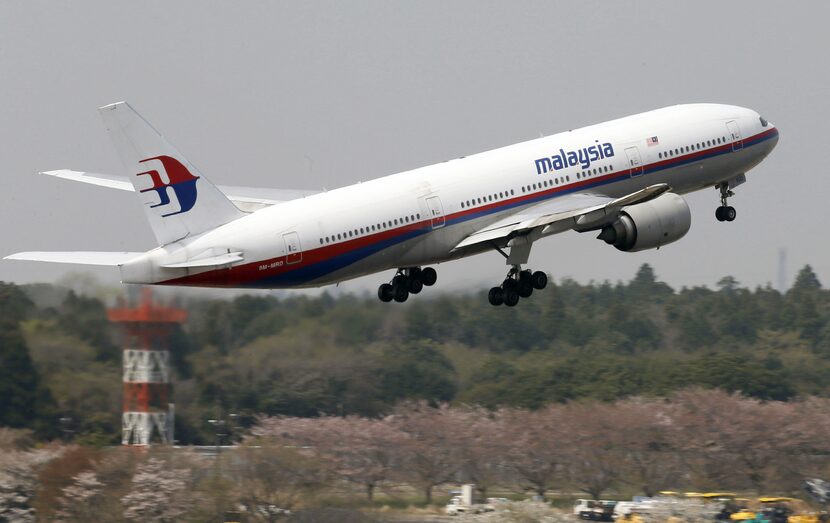 A Malaysia Airlines Boeing 777-200ER similar to the one that lost contact on a flight from...