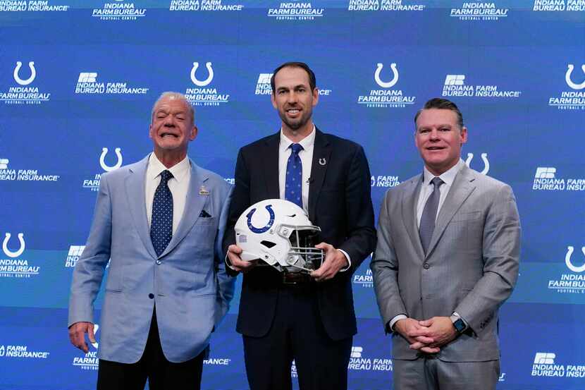 Shane Steichen, middle, Indianapolis Colts owner Jim Irsay, left, and Colts general manager...