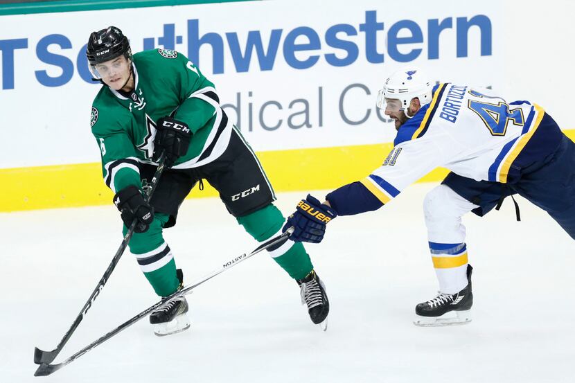 Dallas Stars defenseman Julius Honka (6) and St. Louis Blues defenseman Robert Bortuzzo (41)...