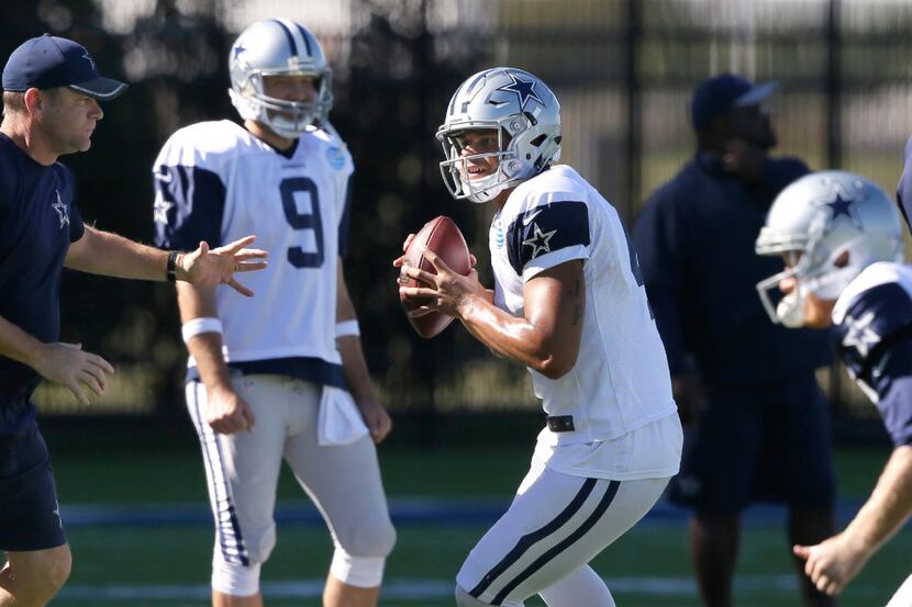 Dallas Cowboys starting quarterback Dak Prescott (4) looks to pass as backup quarterback...