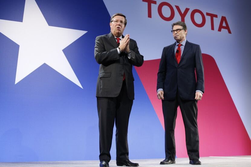 
Jim Lentz, CEO of Toyota North America, greeted Gov. Rick Perry at a relocation ceremony in...