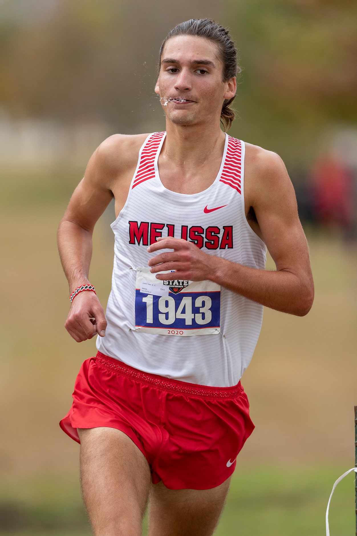 Melissa's Judson Greer (1943) finishes first in the boys UIL Class 4A state cross country...