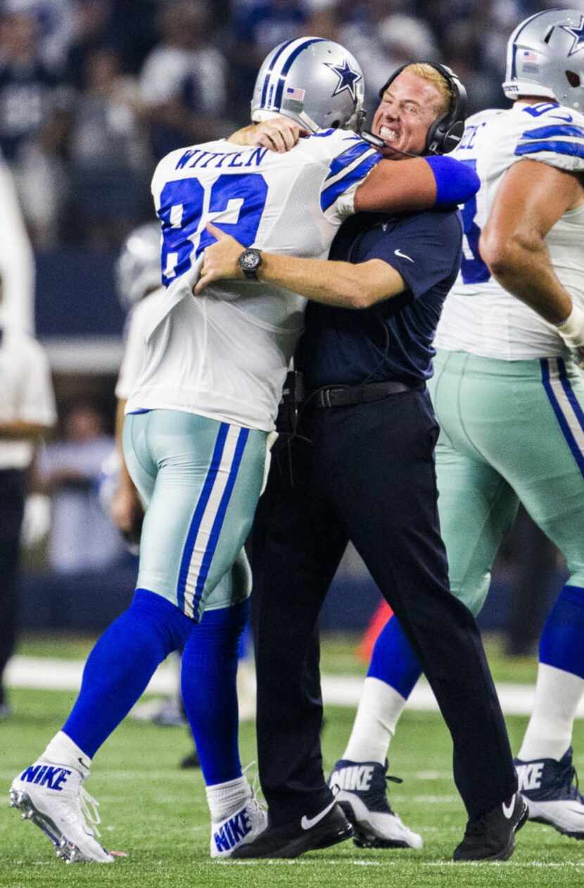 Cowboys tight end Jason Witten hugs head coach Jason Garrett after he scored the winning...