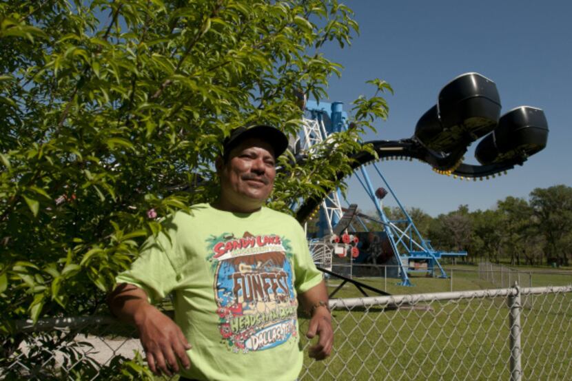 Hector Mirelas, whose family has worked at Sandy Lake Amusement Park for 42 years, planted a...