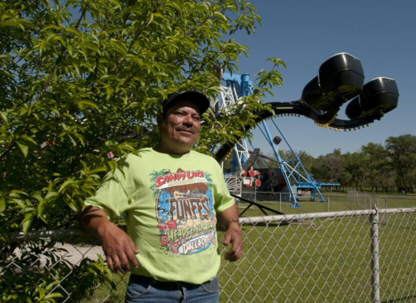Hector Mirelas, whose family has worked at Sandy Lake Amusement Park for 42 years, planted a...