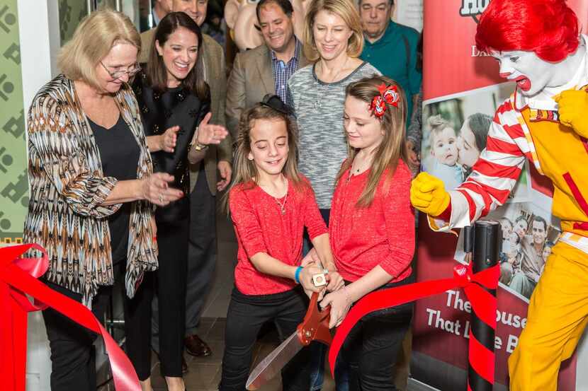 
Kid conductors Livia and Taylor Busby cut a ribbon and blew train whistles to open The...