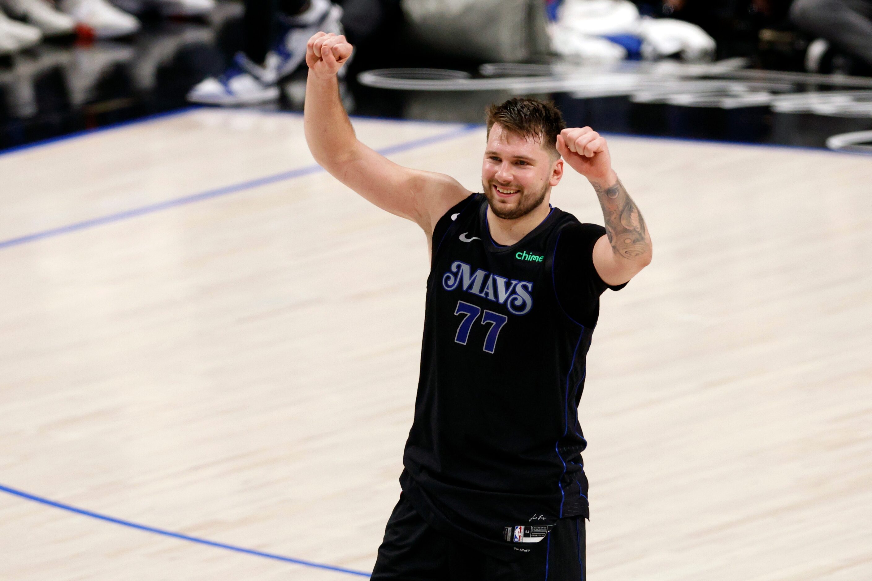 Dallas Mavericks guard Luka Doncic (77) pumps his fists during the closing moments of the...