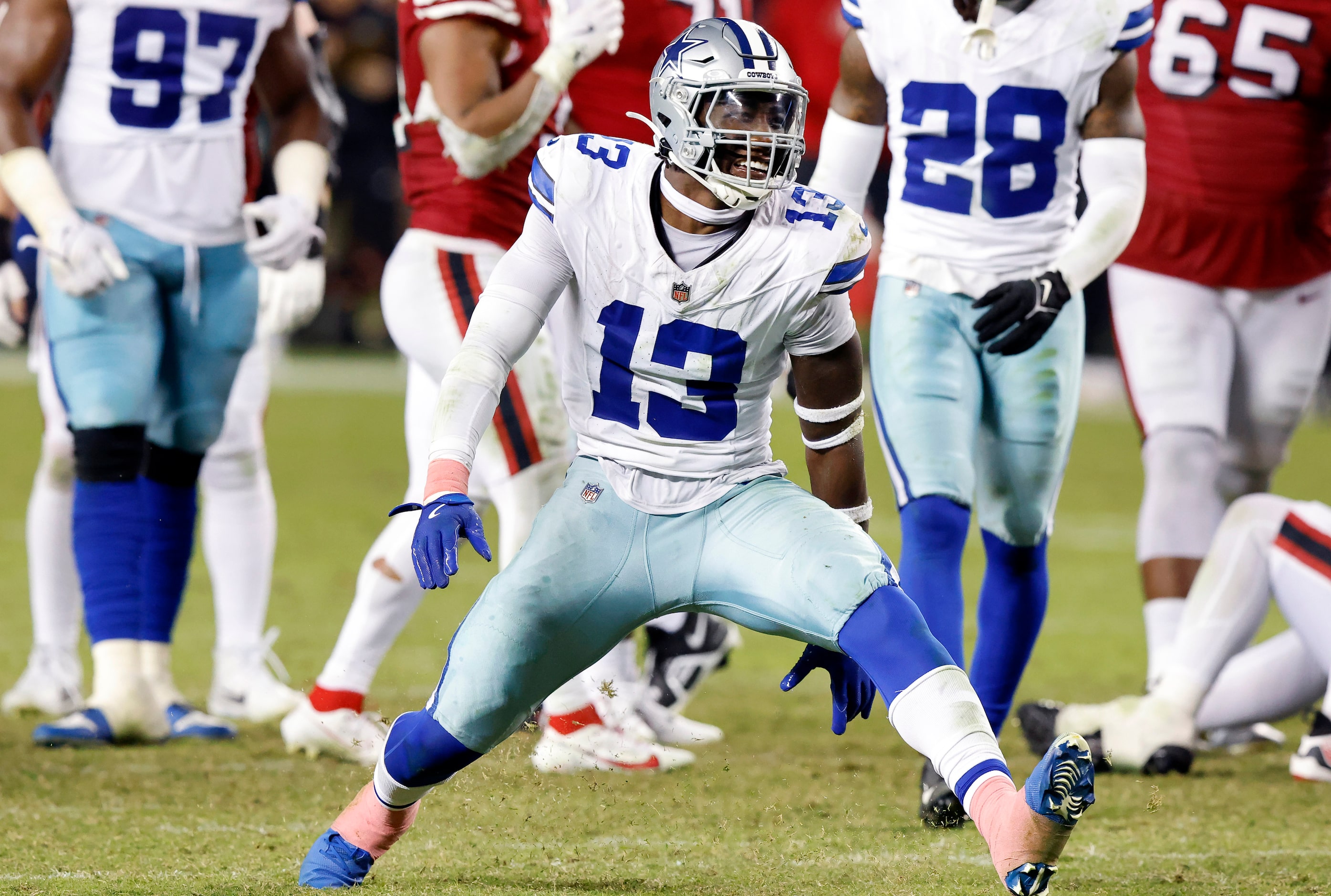 Dallas Cowboys linebacker DeMarvion Overshown (13) celebrates his fourth quarter sack of San...