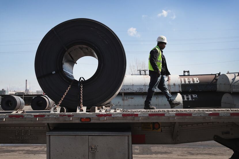 Steel is loaded on a truck for shipping at the NLMK Indiana steel mill in Portage, Ind.