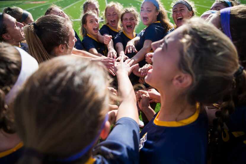 Highland Park players cheer before a UIL conference 5A girls state semifinal soccer game...