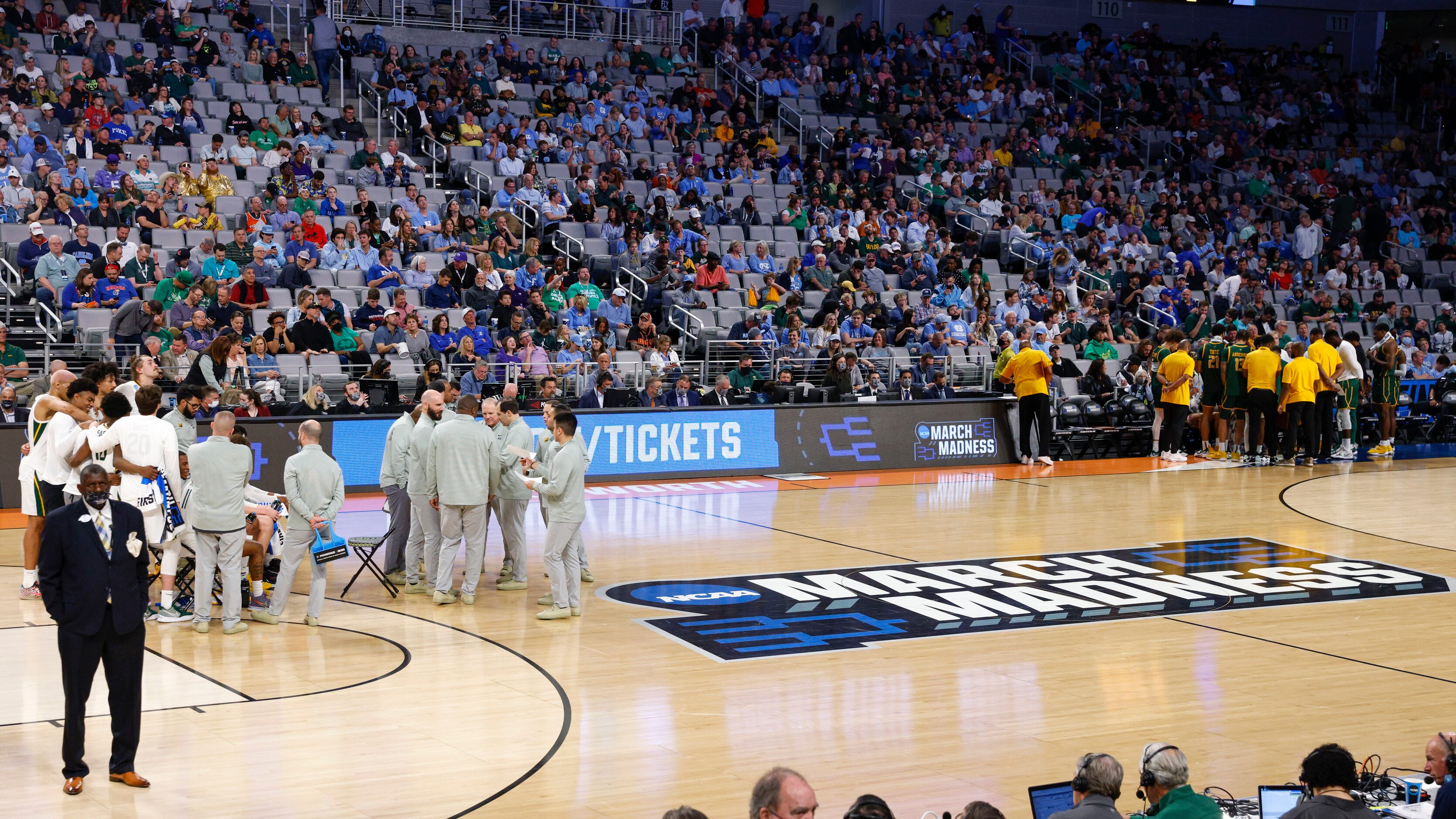 The Baylor Bears team huddles during a timeout during the second half of a first round game...