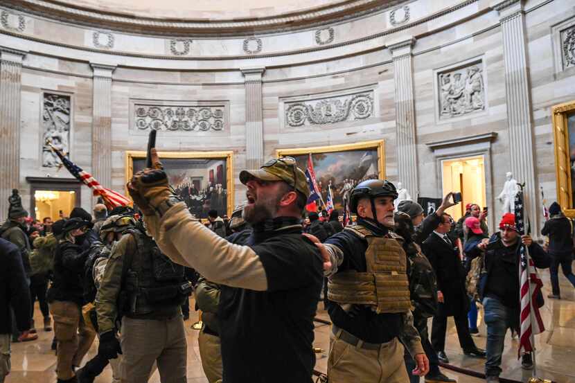 Supporters of President Donald Trump enter the Rotunda of the US Capitol on January 6, 2021....