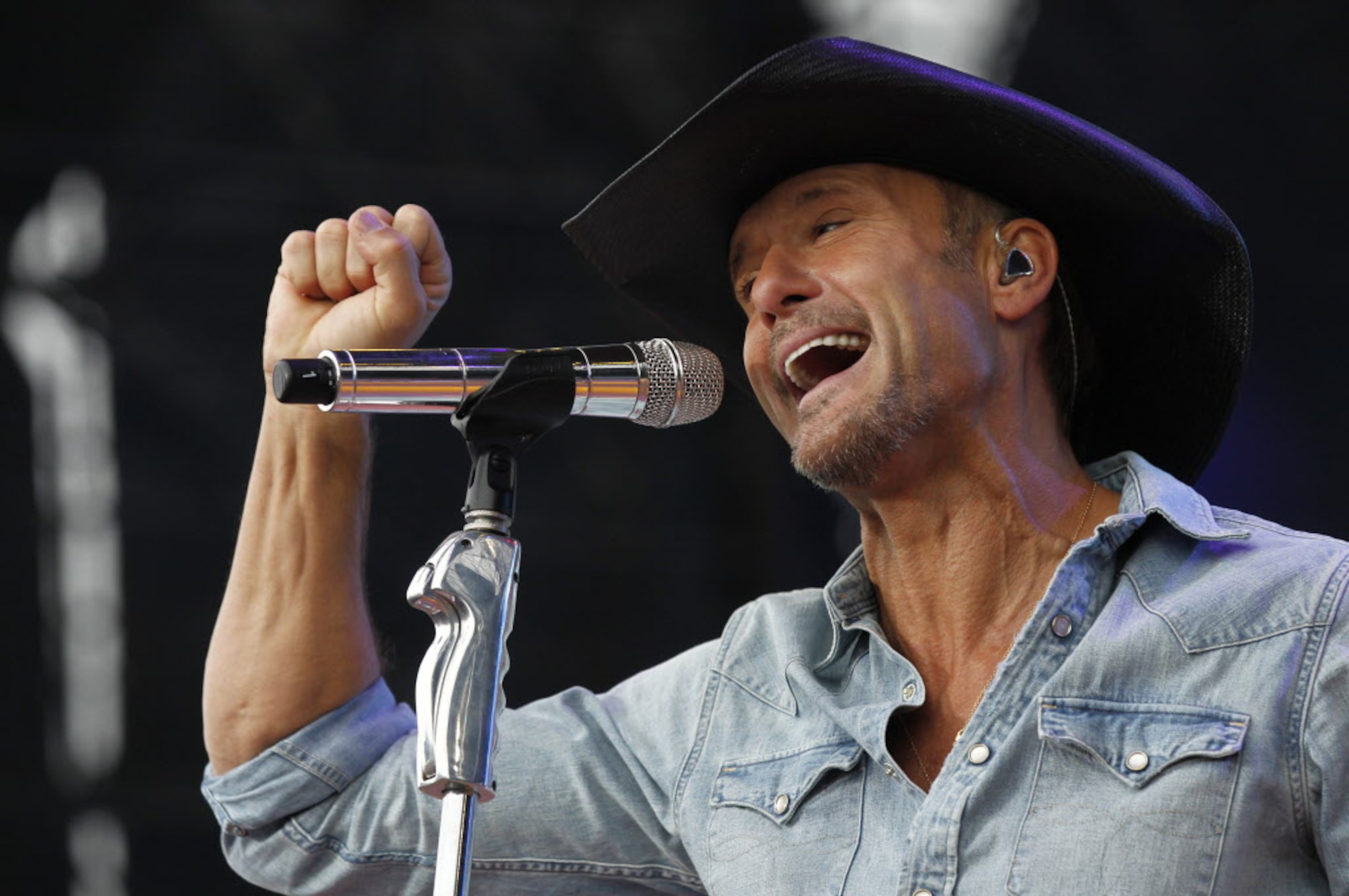 Tim McGraw sings during his performance at the March Madness Music Festival at Reunion Park...