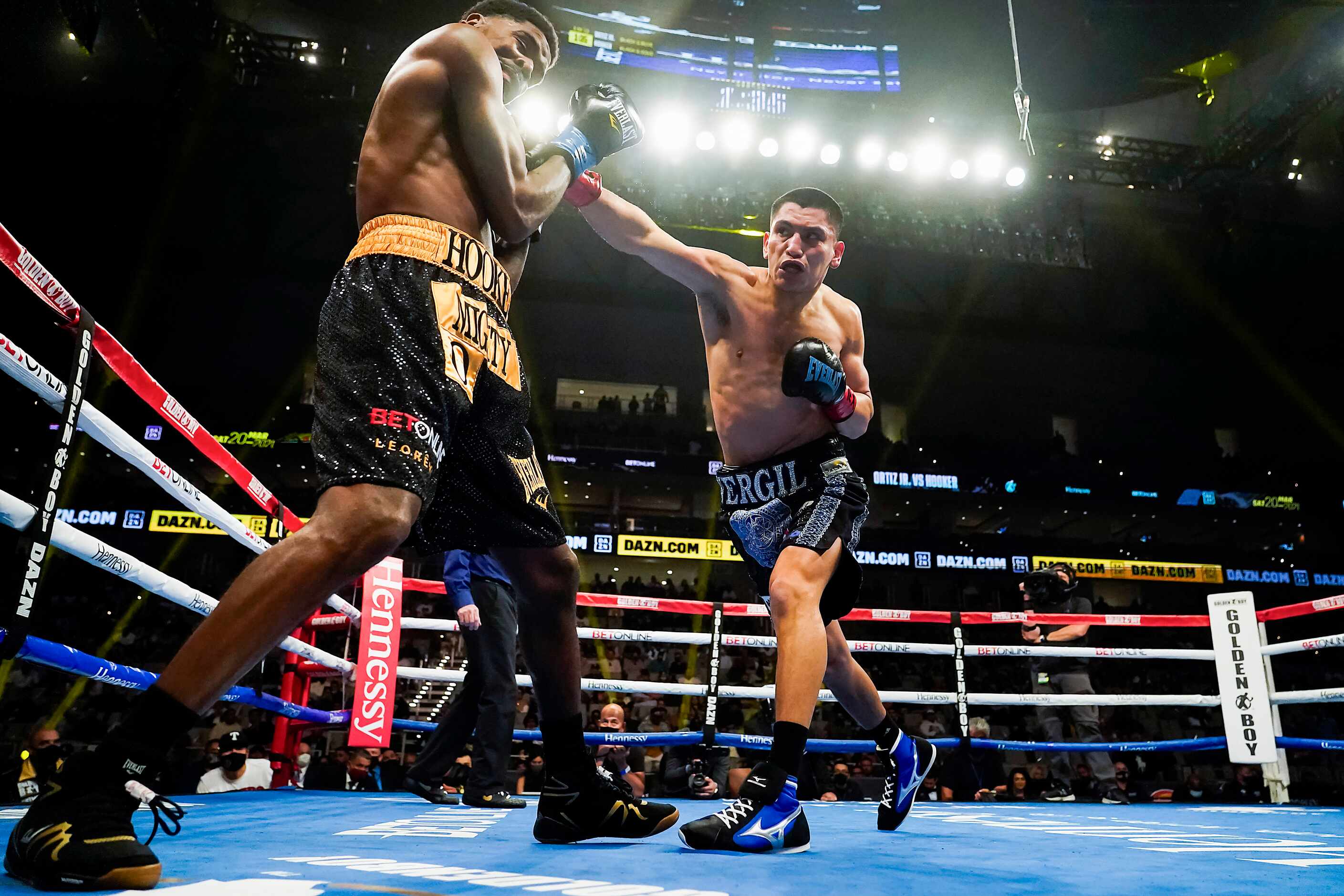 Vergil Ortiz Jr. (left) lands a punch on Maurice Hooker as they fight for the vacant WBO...