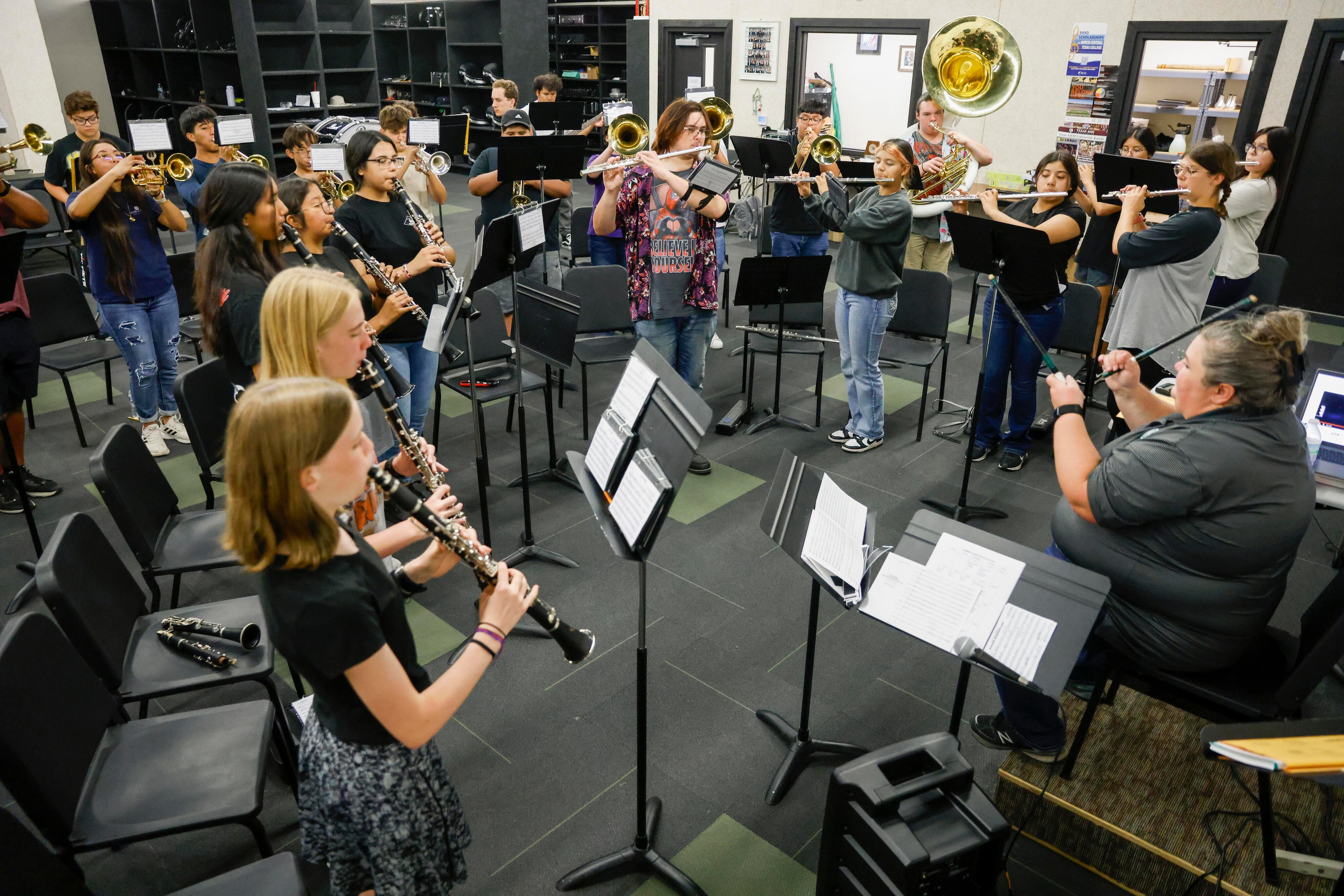 Valley View High School band director Shannon Worley conducts band practice, Wednesday, July...