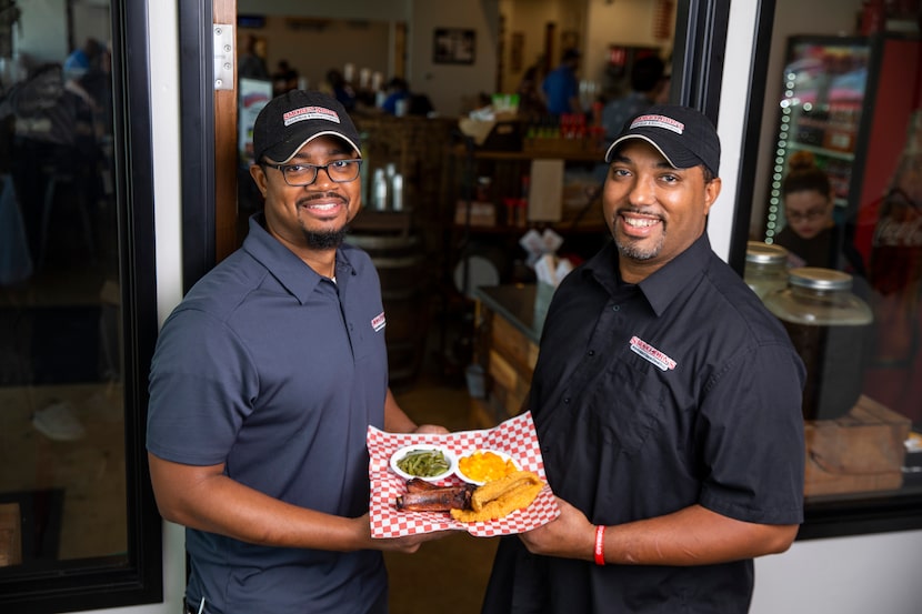 Brent, left, and Juan Reaves, right of Smokey John's Bar-B-Que in Dallas.