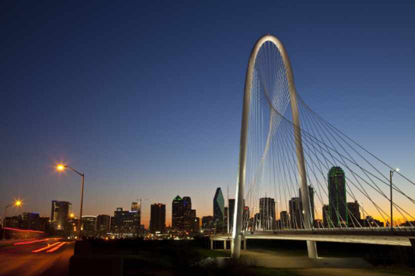Spanning the Trinity River between downtown and West Dallas, the Margaret Hunt Hill Bridge...