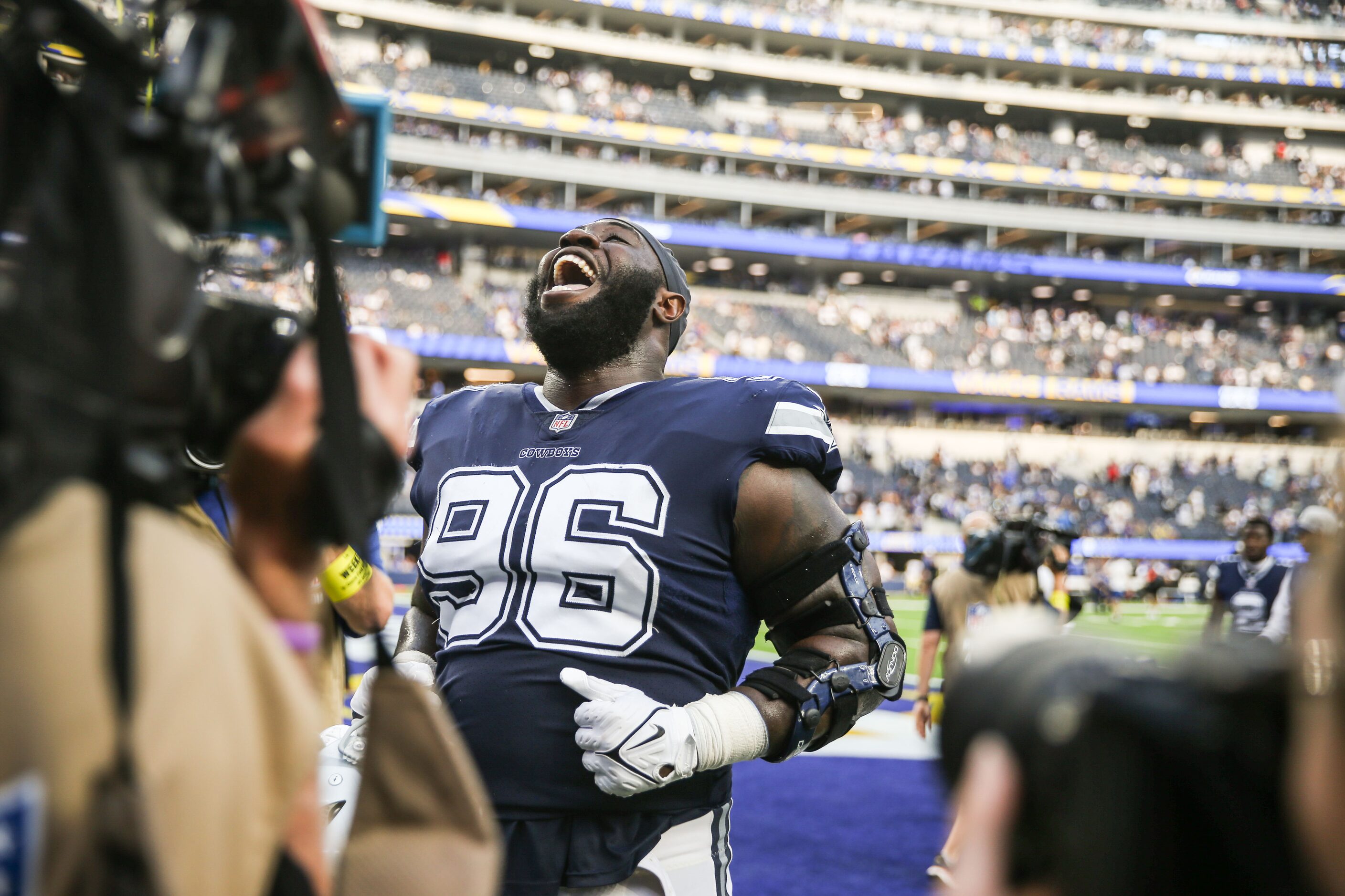 Dallas Cowboys defensive tackle Neville Gallimore (96) celebrates on the field after win the...