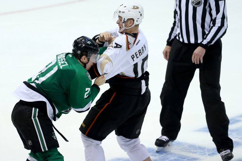 Dallas Stars left wing Antoine Roussel (21) and Anaheim Ducks right wing Corey Perry (10)...