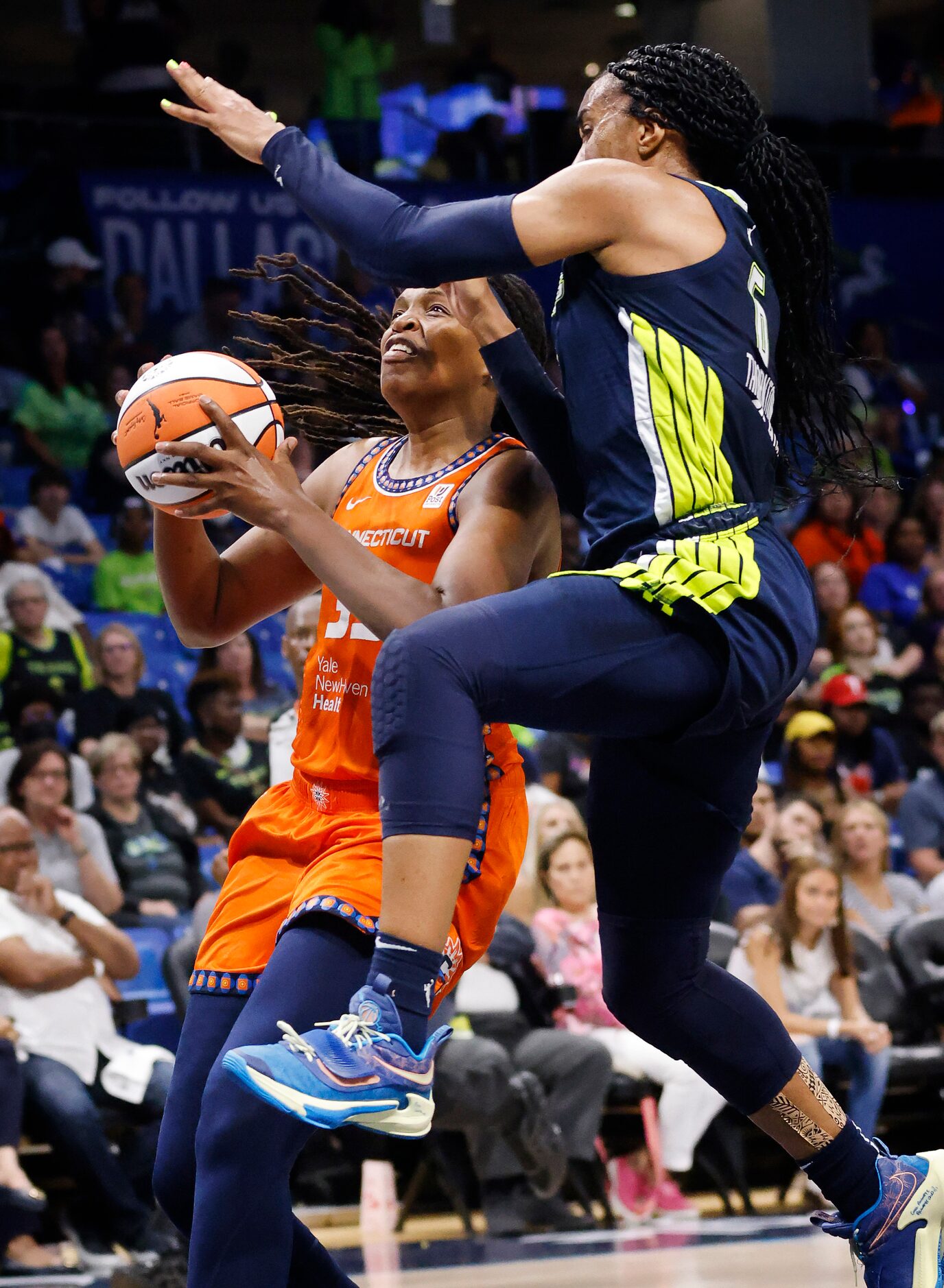 Dallas Wings forward Kayla Thornton (6) tries to block Connecticut Sun forward Jonquel Jones...