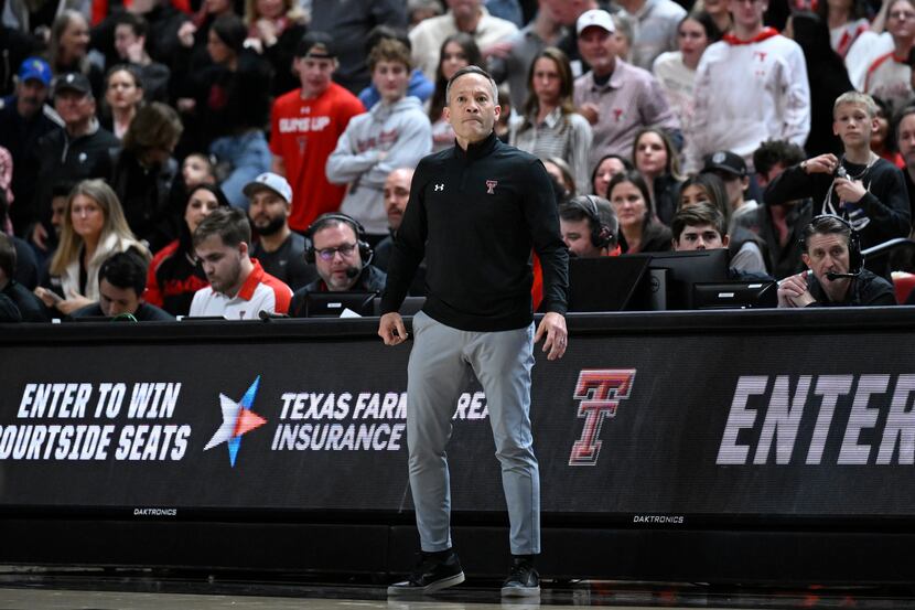 Texas Tech head coach Grant McCasland reacts to a call against Cincinnati during the second...