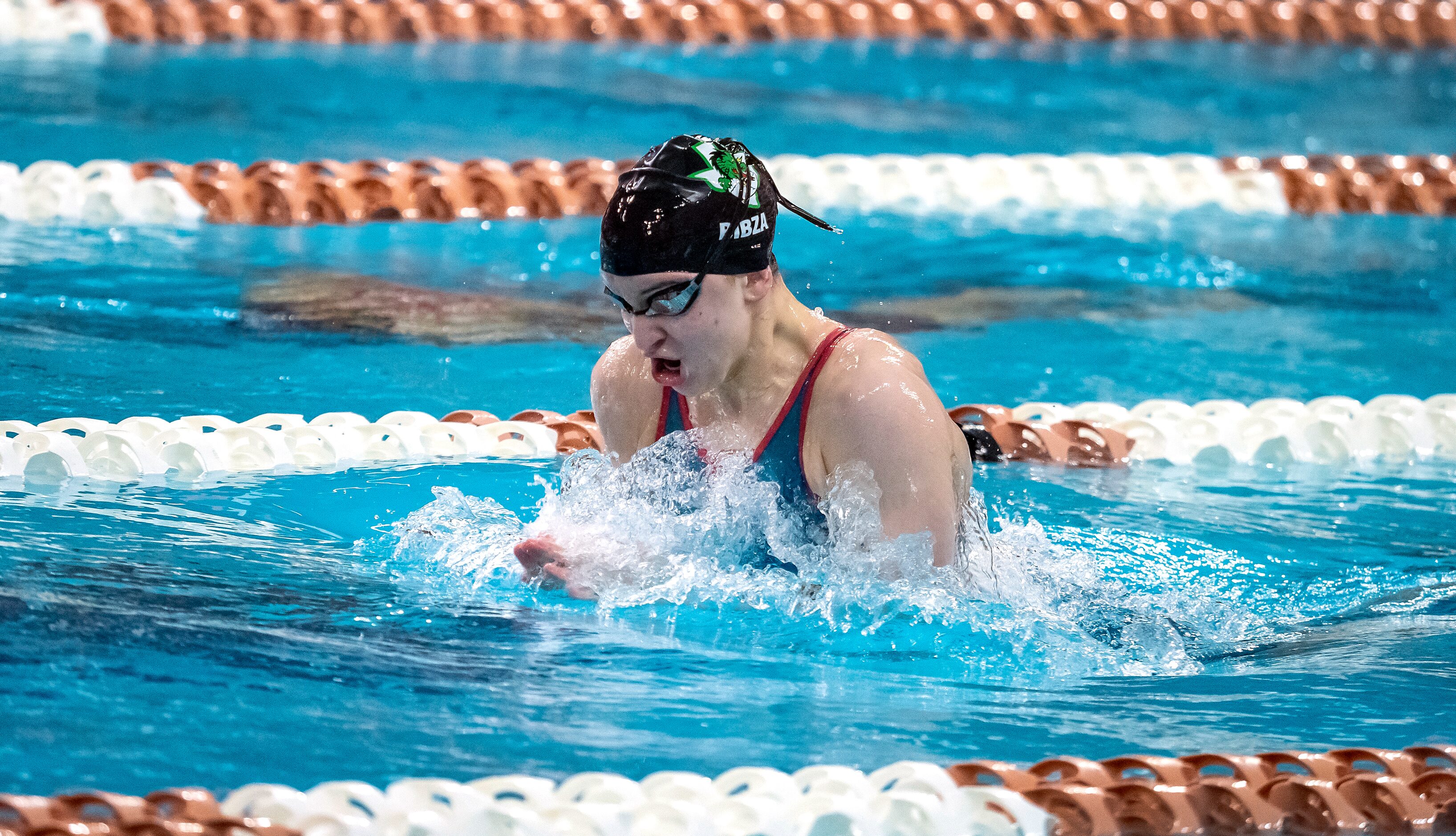 Southlake Carroll's Emma Bibza competes in the 200 meter medley relay during the 2023 UIL...