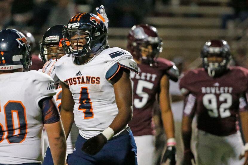 Sachse quarterback Jalen Mayden (4) is all smiles even as he leaves the game after being...
