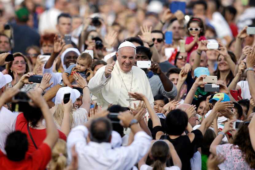  Pope Francis blesses the faithful as he arrives on the occasion of an audience with...