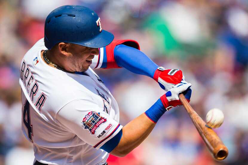 Texas Rangers third base Asdrubal Cabrera (14) bats during the second inning of an opening...