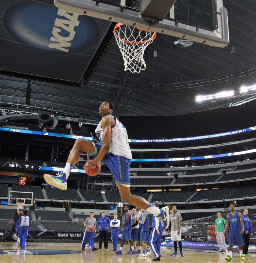 Florida Gulf Coast's Eric McKnight moved in for a dunk Thursday as the Eagles prepared for...