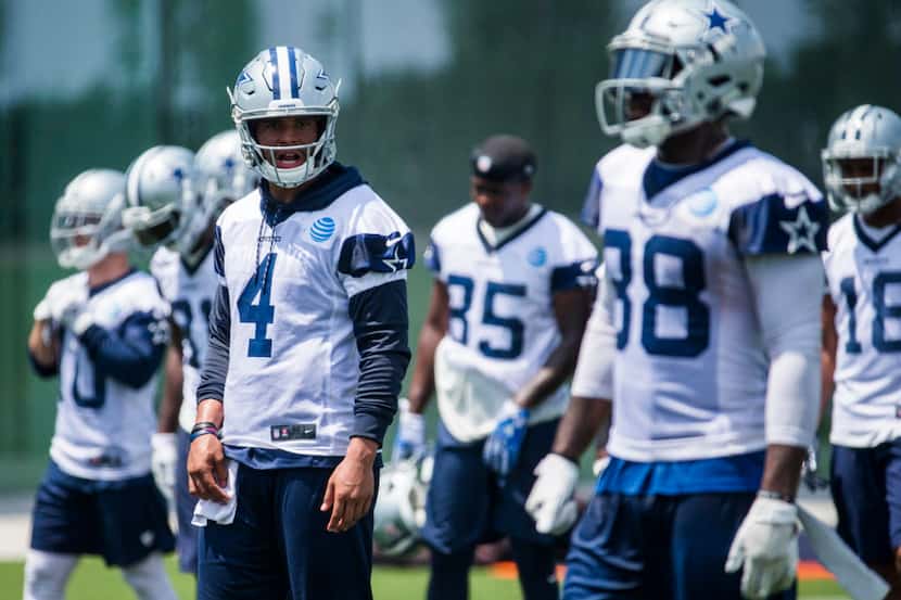 Dallas Cowboys quarterback Dak Prescott (4) calls a play during practice on Wednesday, June...